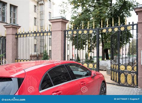 Car Parked On The Entrance Gate Stock Image Image Of Avenue Business