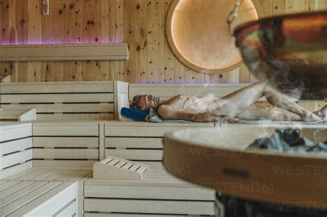 Naked Man Relaxing In Finnish Sauna Stock Photo