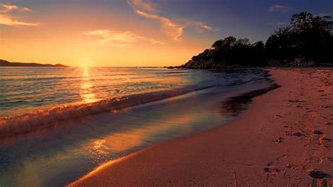 2048x1152 Sea Sunset Beach Sunlight Long Exposure 4k