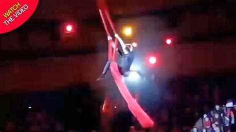 Heart Stopping Moment Acrobat Plummets 15ft To Ground During Daring