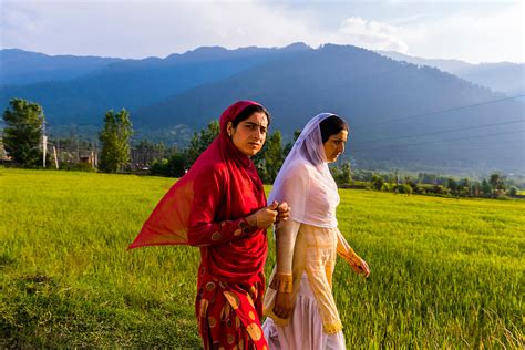 Women Walking Along A Road In The Lush Kashmir Valley Kashmir Jammu And Kashmir State India