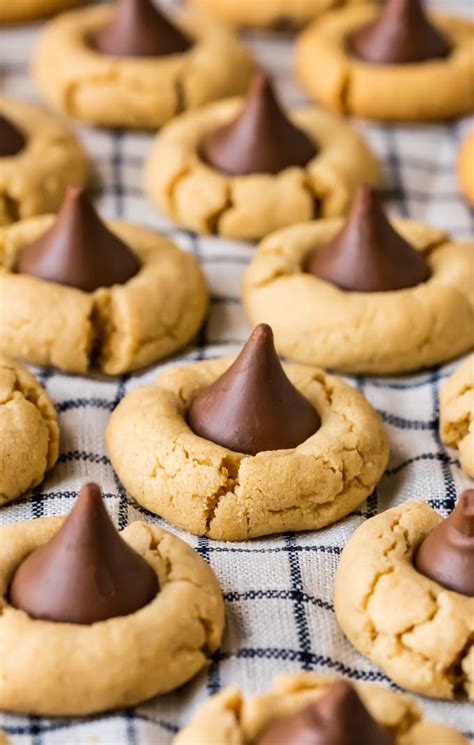 Hershey's kiss cookies are soft and chewy chocolate cookies topped with hershey kisses, ready in under 30 minutes! Best Peanut Butter Hershey's Kiss Cookies Recipe {VIDEO!}