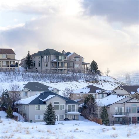Square Houses On Snowy Setting In Winter With Magnificent View Of