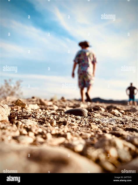 Blurred Man Walking While Exploring The Desert Stock Photo Alamy