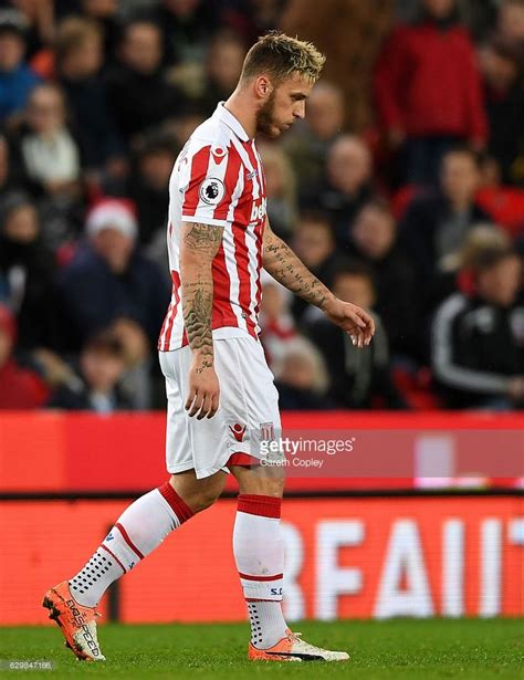 Marko Arnautovic Of Stoke City Walks Off The Pitch After Shown The Red Card During The Premier