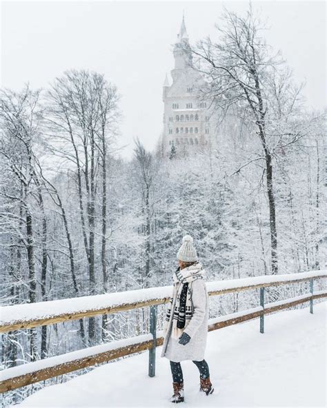 Neuschwanstein Castle In The Snow In Winter On The Walking Path To Mary