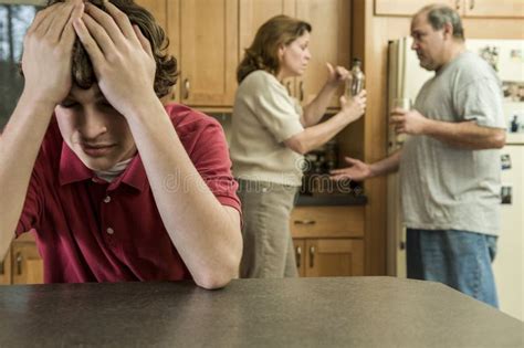Teen Boy Suffers While Parents Fight Stock Photo Image Of Drama