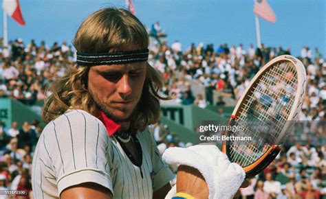 Swedish Tennis Star Bjorn Borg With His Trademark Wooden Racket