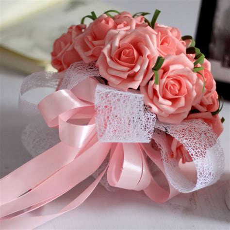 new year romantic pink ribbon rose wedding bridal bridesmaid flower bouquet bride holding