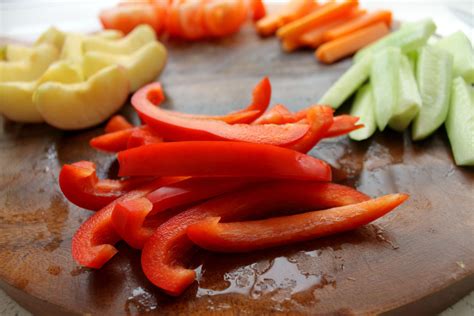 Cut Vegetables On A Wooden Plate