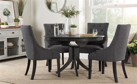 They're the embodiment of craftsmanship and design. Hudson Round Grey Wood Extending Dining Table with 4 Duke ...