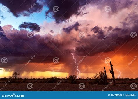 Dramatic Sunset Sky With Storm Clouds And Lightning Over The Arizona
