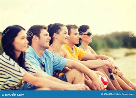 Group Of Friends Having Fun On The Beach Stock Photo Image Of