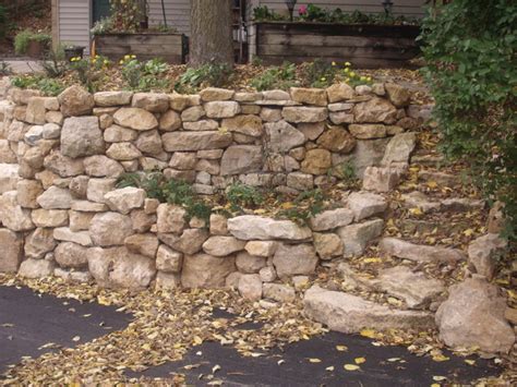 Natural Limestone Boulder Retaining Wall With Built In Stairway
