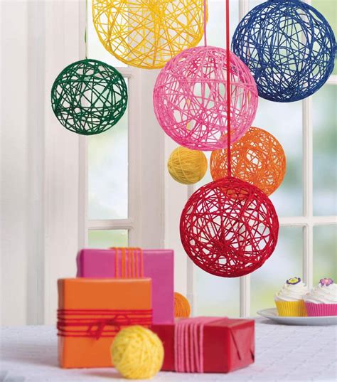 Hanging Yarn Balls Directions Blow Up Various Size Balloons To