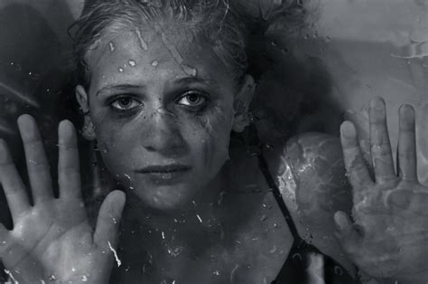 Portrays A Girl Who Has Been Trapped Behind Glass Representing A Trapped Emotional State