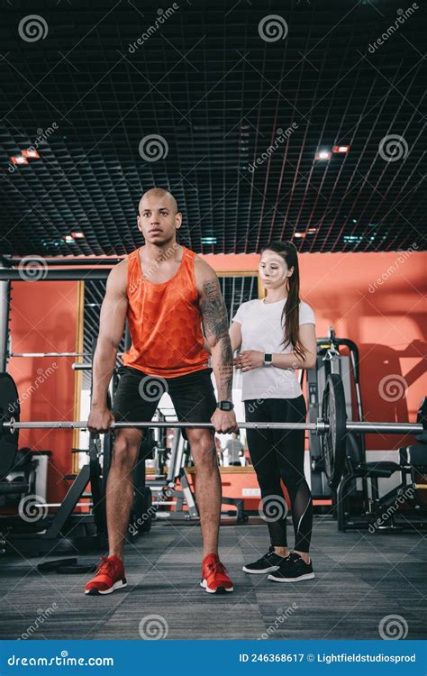 Attentive Trainer Standing Near African American Stock Image Image Of