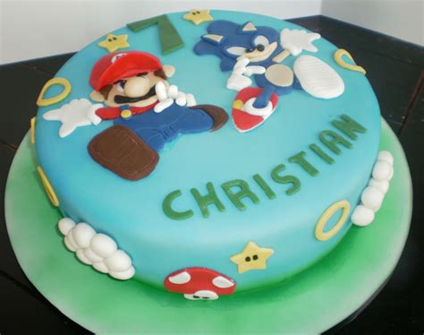 This years birthday cake creation for minion #1 was sonic the hedgehog for the wii themed birthday party. Sonic And Mario Cake - CakeCentral.com