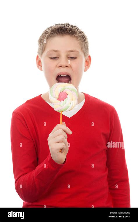Portrait Of Cute Joyful Boy With Big Lollipop Stock Photo Alamy