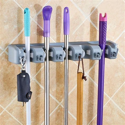 Wall Mounted Broom And Garden Tool Holder At Mighty Ape Nz