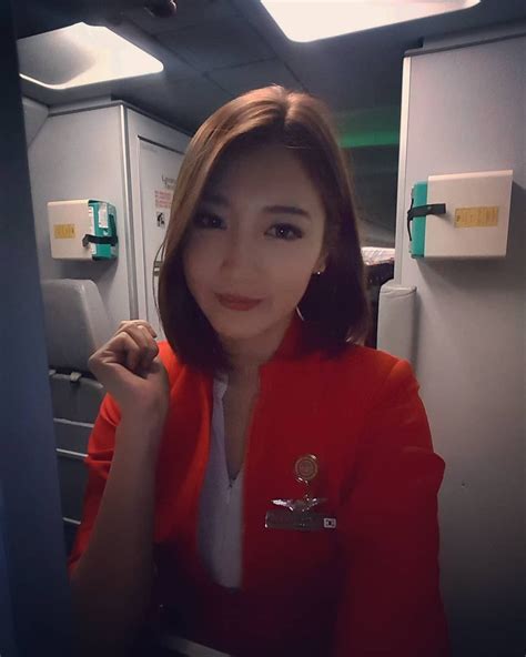 pin by cabin crew uniform on airasia エアアジア cabin crew stewardess flight attendant