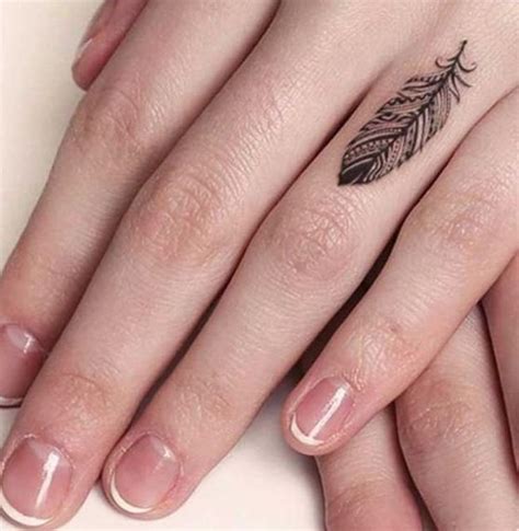 50 Delicate And Tiny Finger Tattoos To Inspire Your First Or Next