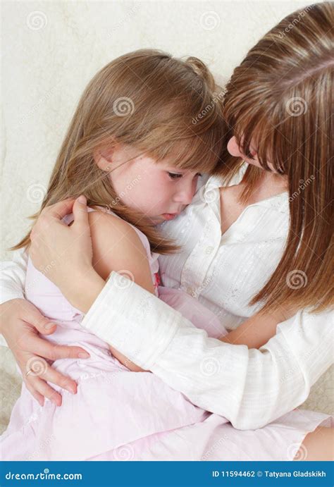 Mother Calms The Crying Daughter Stock Photo Image Of Holding