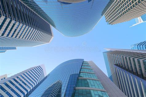 Skyscrapers On Blue Sky Background In Modern Or Futuristic Downtown Of