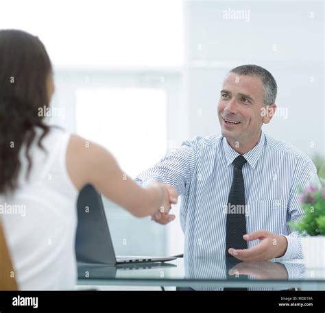 Closeuphandshake Manager And Client Stock Photo Alamy