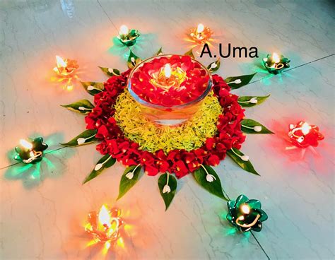 Beautiful Flower Arrangement With Colourful Diyas For Diwali Flower
