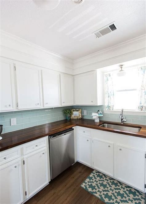 You can match the countertops for a cohesive look or match a concrete backsplash with white solid surface or butcher block counters. Butcher Block Counters ... Love the look ... with the ...