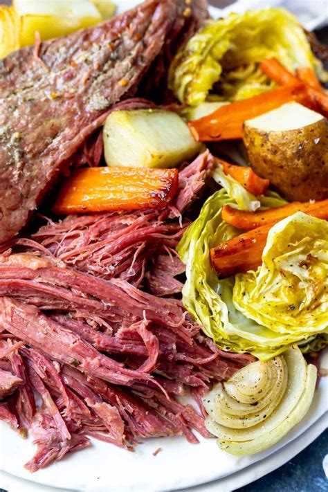 shredded corned beef recipe served on white platter with ...