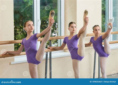 Cute Young Ballerinas Stretching Legs Stock Image Image Of Goal
