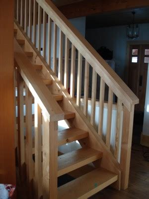 A staircase featuring a runner creates a beautiful focal point in your home, but you have to be sure to select the proper runner. Interior Finishes ⋆ Tamlin Homes | Timber Frame Home Packages
