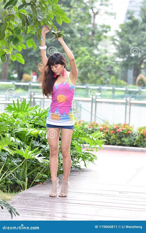 Beautiful Asian Girl Shows Her Youth In The Park Stock Image Image Of