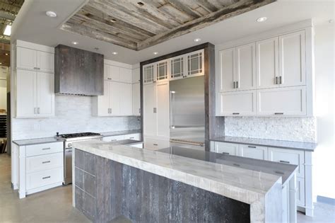 Matching these grey slate tiles with wood and stone materials is a popular technique for creating a rustic design. Rustic Chic Grey and White Kitchen - Rustic - montreal - by Ateliers Jacob Kitchens & Spaces
