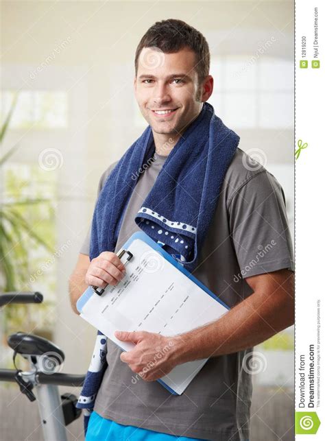 Personal Trainer with Training Plan. Stock Photo - Image of home ...