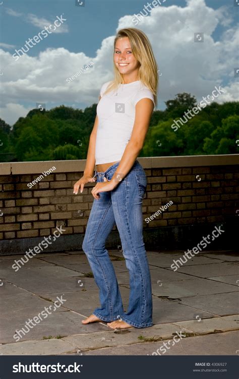 Young Pretty Girl Posing Barefoot Stock Photo 4306927