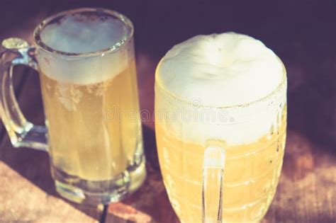 Close Up Two Cold Beers With Foam And Drops Stock Image Image Of