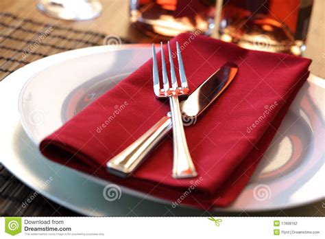Use coffee spoons or dessert spoons as appropriate at a formal dinner. Restaurant Dinner Place Setting Stock Photo - Image of ...