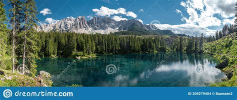 The Majestic Lake Of Lago Di Carezza Beautiful Green And Turquoise