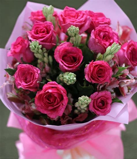 1 Dozen Pink Roses Round Bouquet
