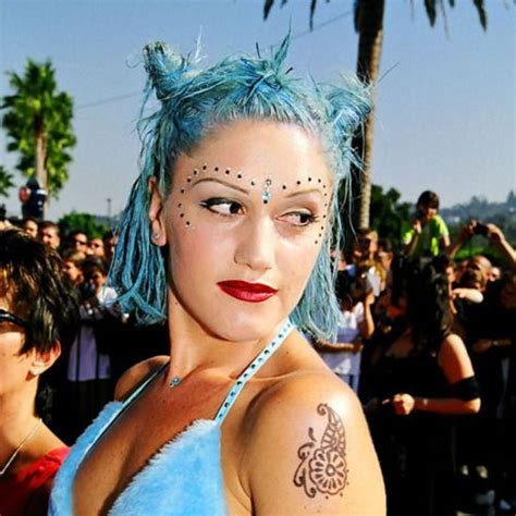 Somehow she manages to make a cropped striped sequined halter top look classy. No Doubt Gwen Stefani from 90's | Gwen stefani, Seapunk ...