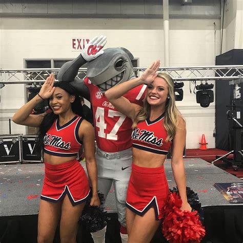 Ole Miss Cheerleaders With The New Land Shark Mascot Ole Miss Ole Miss Football Hot Cheerleaders