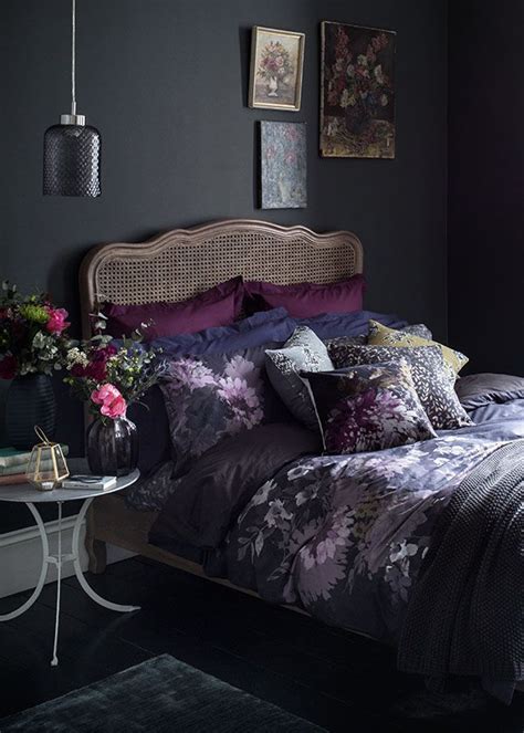 The layered textures in the space make you want to kick your shoes off and relax. This moody floral bedroom idea is a lesson in dark romance ...