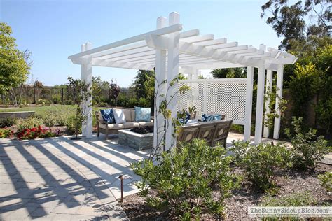 While the flames are mesmerizing, with the smokey smell and crackling sounds, a fire pit's warmth also makes it possible for you to begin your outdoor entertaining a little earlier each spring, and extend it into the fall. Outdoor Pergola and Fire pit - The Sunny Side Up Blog