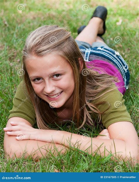 Girl Laying In The Grass Stock Image Image Of Beautiful 23167505