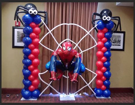 A Spiderman Balloon Sculpture On Display In An Office