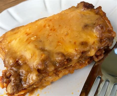 This chicken enchilada bake recipe was one i created many years ago when the fridge and cupboards were quite bare. Layered Enchilada Casserole Recipe | Recipes.net