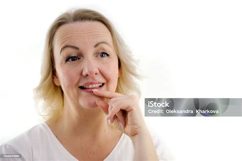 Middleaged Woman Dreams Looks Surprised Holds Hand Near Mouth Ad